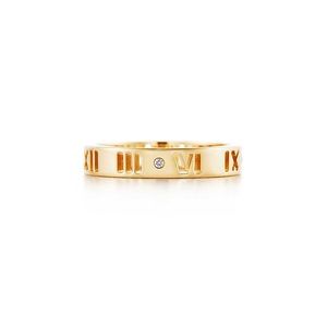 Tiffany & Co Gold Atlas ring with diamond